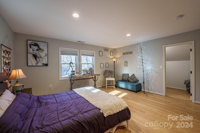 bedroom with light wood-type flooring