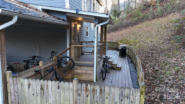 wooden deck featuring area for grilling