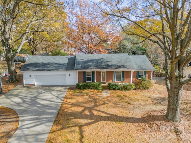 single story home with a garage