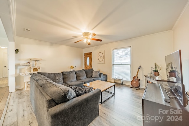 living room with ceiling fan, light hardwood / wood-style floors, and ornamental molding