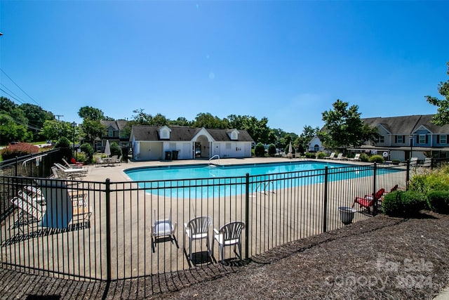 view of pool featuring a patio