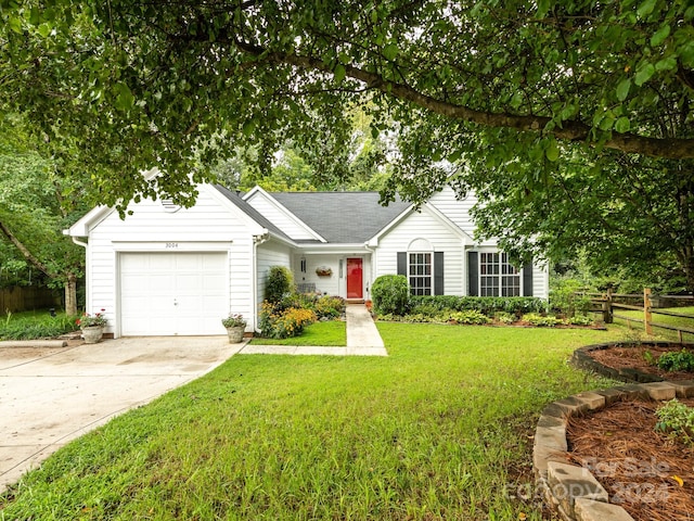 single story home with a front lawn and a garage