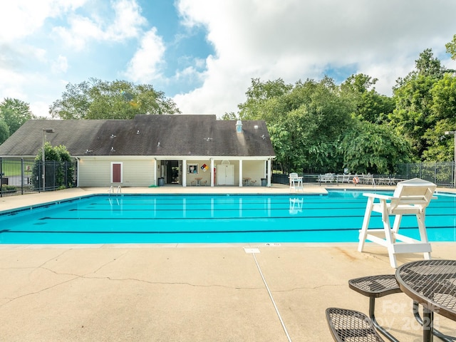 view of swimming pool featuring a patio area