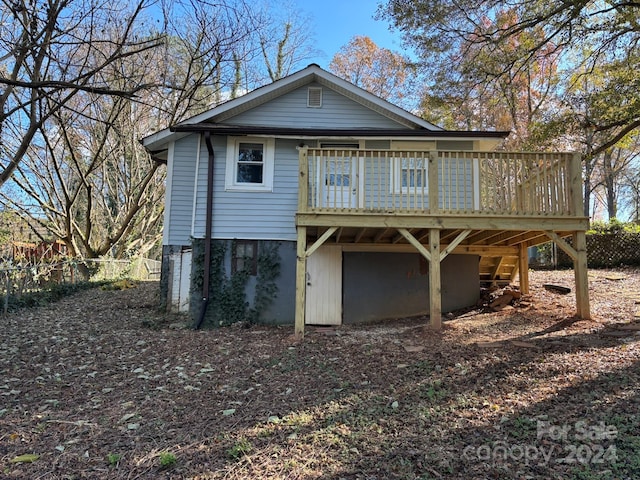 view of front of property with a deck