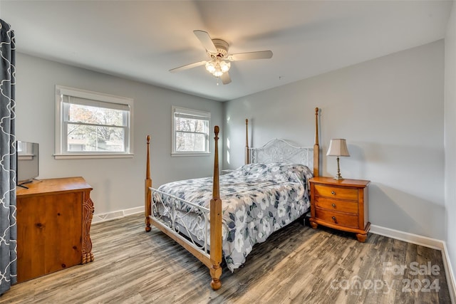 bedroom featuring ceiling fan and hardwood / wood-style floors