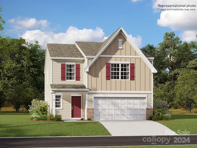 view of front of house featuring a garage and a front lawn