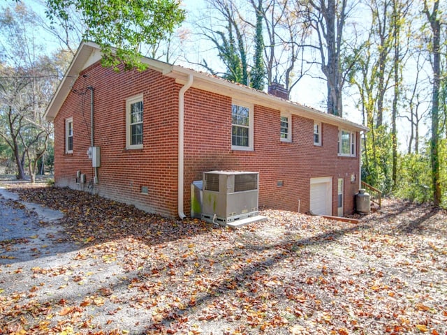 view of home's exterior featuring a garage