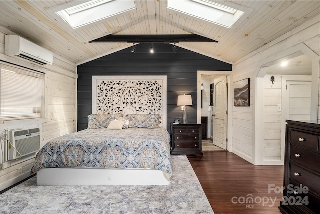 bedroom featuring lofted ceiling with skylight, wooden walls, and a wall mounted AC