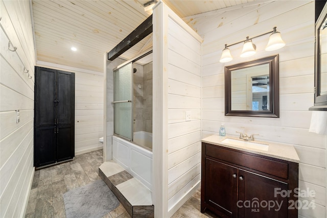 bathroom featuring combined bath / shower with glass door, wood-type flooring, wooden ceiling, and wooden walls