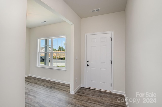 entrance foyer with dark hardwood / wood-style flooring