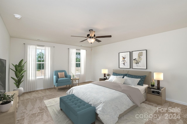 bedroom featuring light carpet and ceiling fan