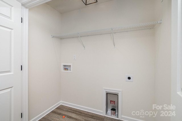 washroom with hardwood / wood-style floors, hookup for an electric dryer, and hookup for a washing machine