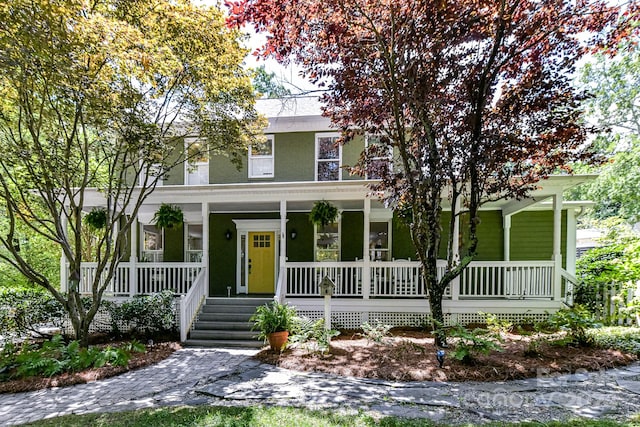 view of front of home featuring covered porch