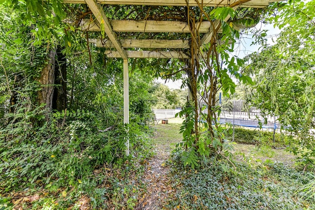 view of yard with a pergola