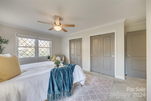 bedroom featuring ceiling fan, crown molding, and light carpet