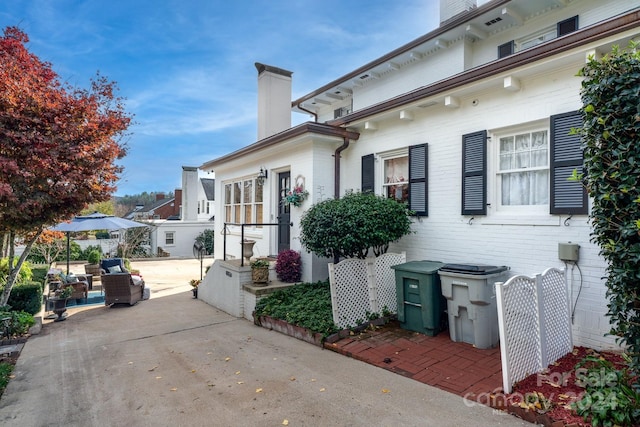 view of home's exterior featuring a patio