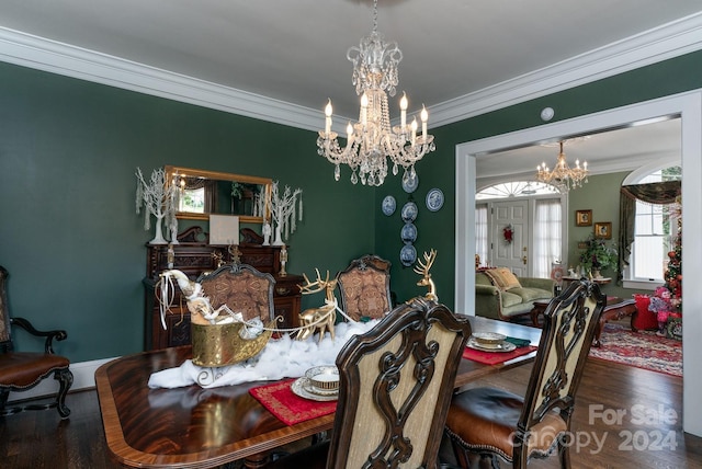 dining room with wood-type flooring and ornamental molding