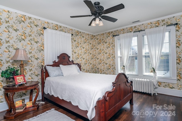 bedroom with ceiling fan, crown molding, dark wood-type flooring, and radiator