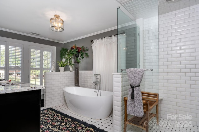 bathroom featuring ornamental molding, vanity, tile walls, independent shower and bath, and tile patterned flooring