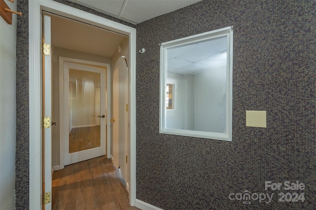 corridor with dark wood-type flooring