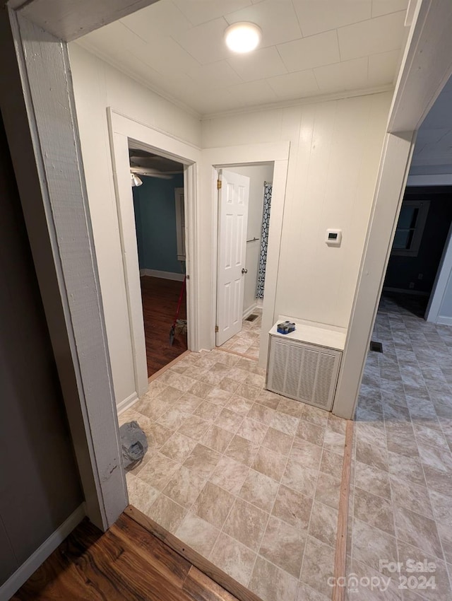 corridor featuring light hardwood / wood-style floors