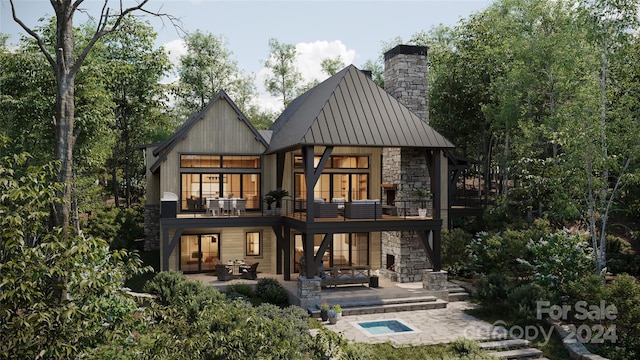 rear view of property featuring an outdoor living space, a balcony, and a patio