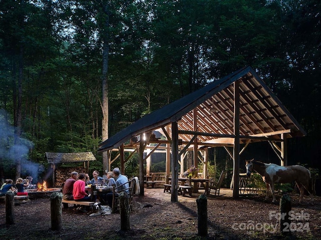 view of home's community featuring an outdoor structure