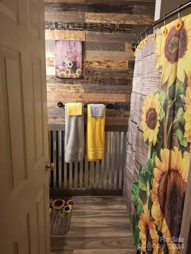 mudroom featuring wood-type flooring