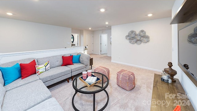 living room featuring light colored carpet