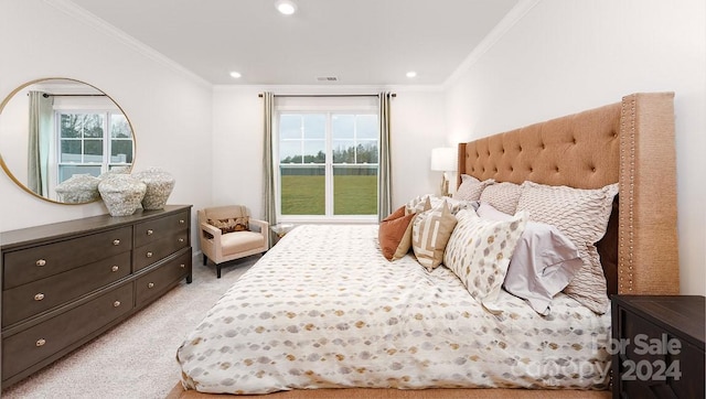 bedroom with light colored carpet and ornamental molding