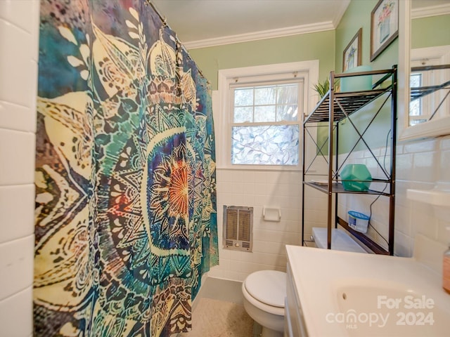 bathroom with crown molding, toilet, tile walls, and vanity