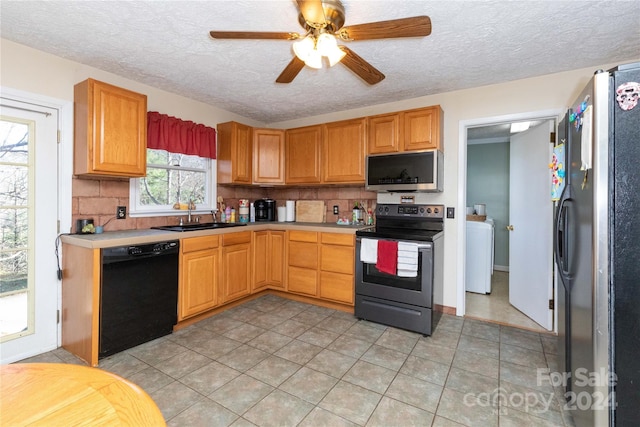 kitchen featuring sink, ceiling fan, light tile patterned floors, appliances with stainless steel finishes, and tasteful backsplash