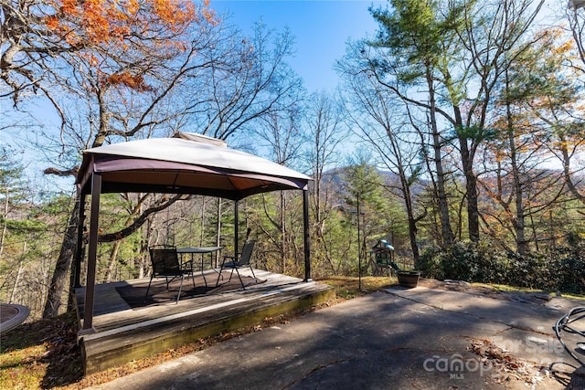 view of yard featuring a gazebo and a patio