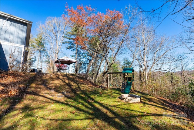 view of yard with a playground