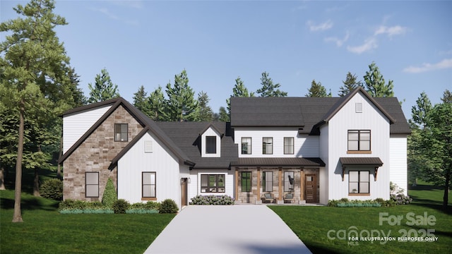 view of front of house featuring a porch, stone siding, board and batten siding, and a front yard