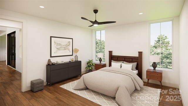 bedroom with baseboards, ceiling fan, wood finished floors, and recessed lighting