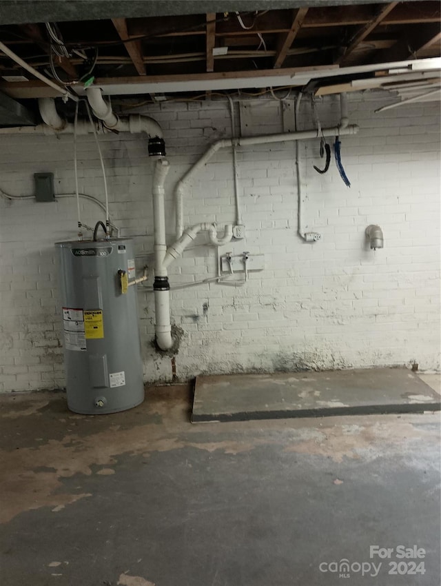 basement featuring electric water heater