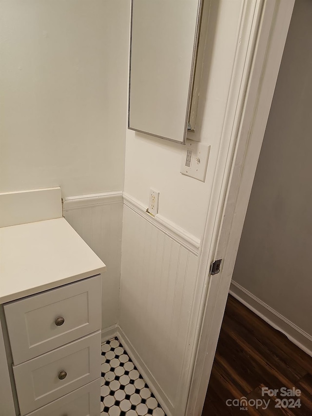 bathroom featuring wood-type flooring