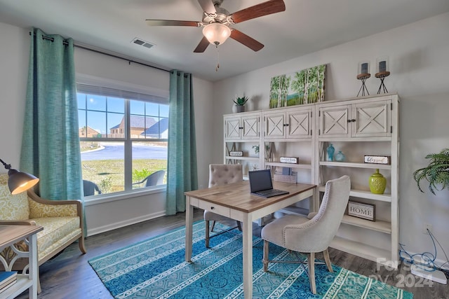 office featuring dark hardwood / wood-style floors and ceiling fan