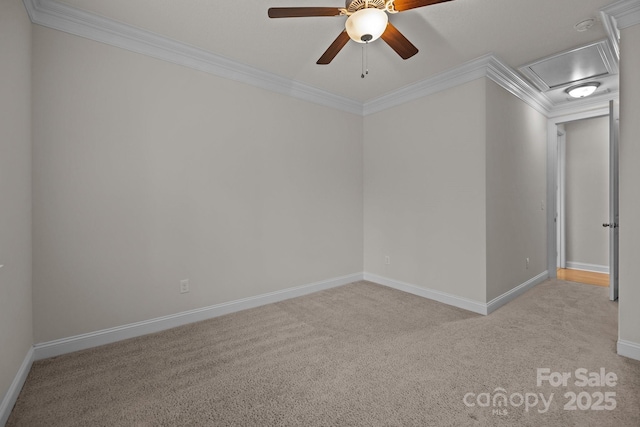 unfurnished room featuring light carpet, ceiling fan, and crown molding