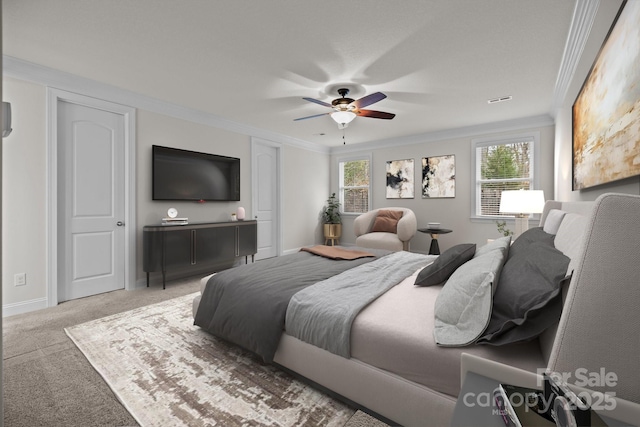 bedroom featuring ceiling fan, crown molding, and light colored carpet