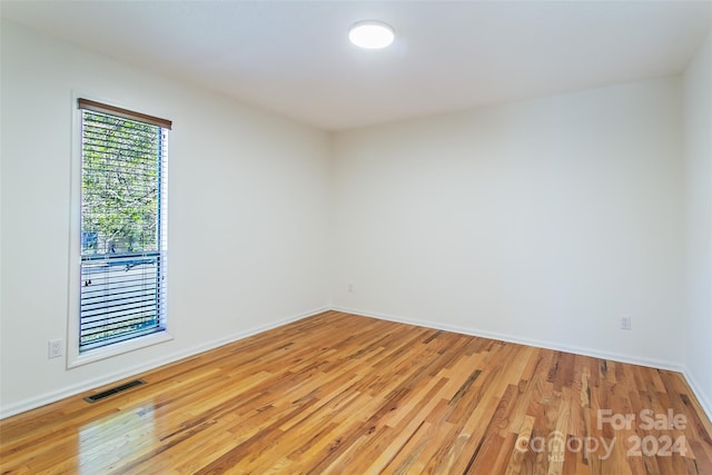 empty room featuring light hardwood / wood-style floors