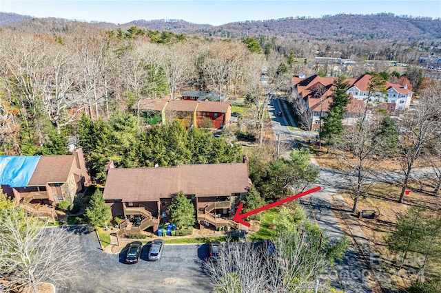 birds eye view of property featuring a mountain view