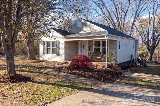 bungalow-style house with covered porch