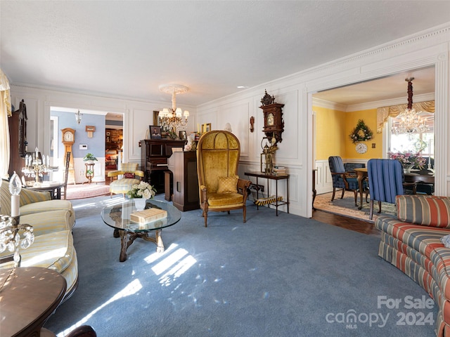 carpeted living room featuring a notable chandelier and ornamental molding