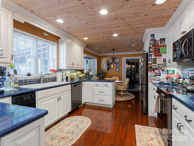 kitchen featuring white cabinets, sink, tasteful backsplash, dark hardwood / wood-style flooring, and stainless steel appliances