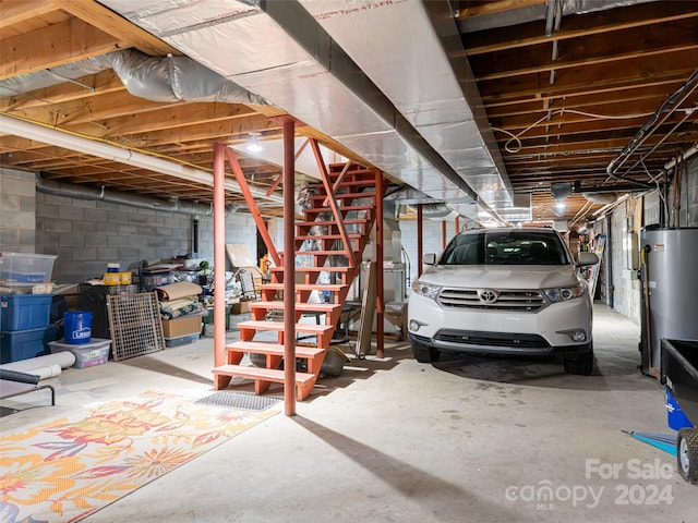 basement featuring gas water heater