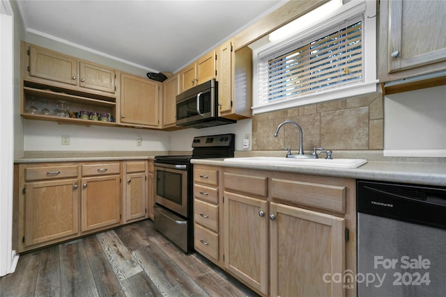 kitchen with dark hardwood / wood-style flooring, stainless steel appliances, crown molding, sink, and light brown cabinets