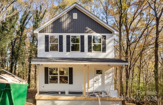 view of outdoor structure with covered porch