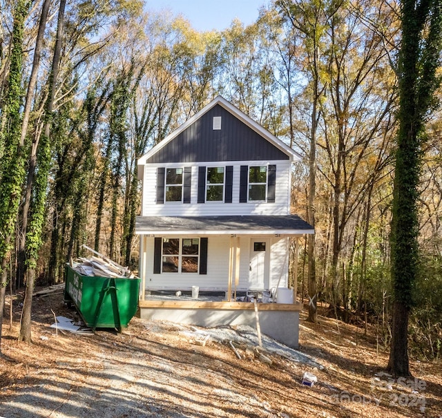 view of property with covered porch